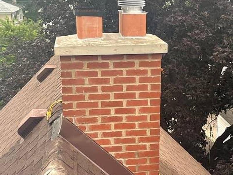 rebuilt stack squared up with a new crown on a chimney in Woodbridge, NJ